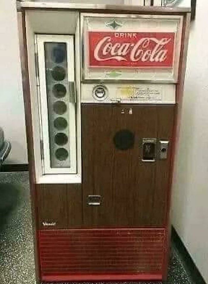 A vintage Coca-Cola vending machine, a retro image that might take you way back.