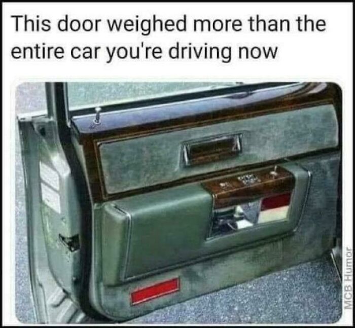 The interior of a heavy vintage car door, designed to take you way back to older car models.