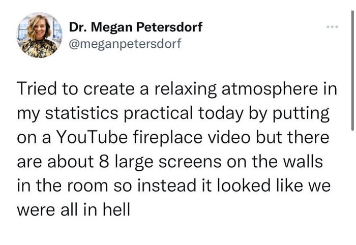 Tweet about trying to create a relaxing atmosphere in statistics class with a YouTube fireplace, but screens made it look like hell.