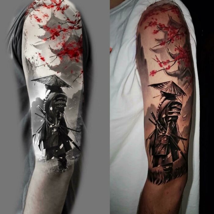Samurai tattoos with red cherry blossoms on forearms, showcasing cool tattoos with detailed black and gray shading.