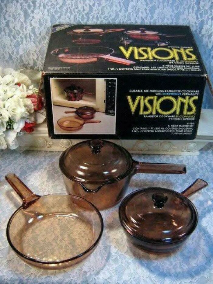 Vintage Visions cookware set with glass pans and lids, a nostalgic kitchen item for Gen X collectors and enthusiasts