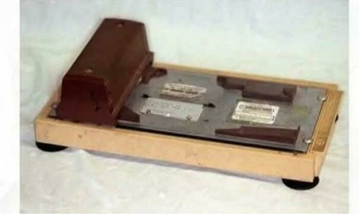 Vintage gaming console component on a white surface, evoking nostalgic and relatable Gen X memories.