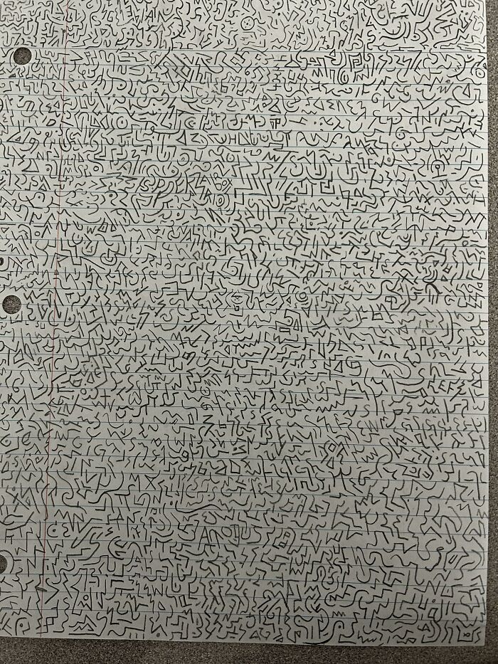 Intricate abstract doodle blending with lined paper, showcasing perfectly camouflaged shapes that might take ages to find.