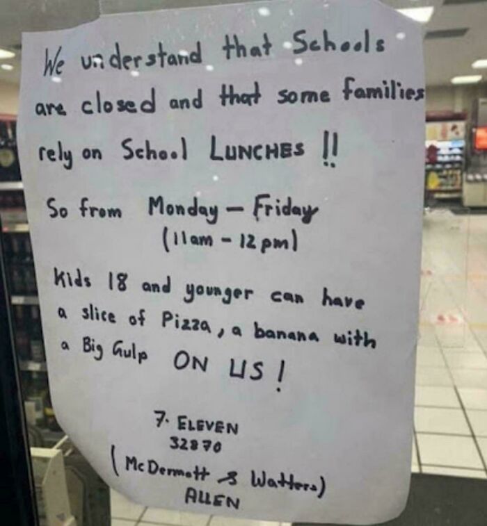 Sign offering free school lunches with pizza and banana for kids during school closures