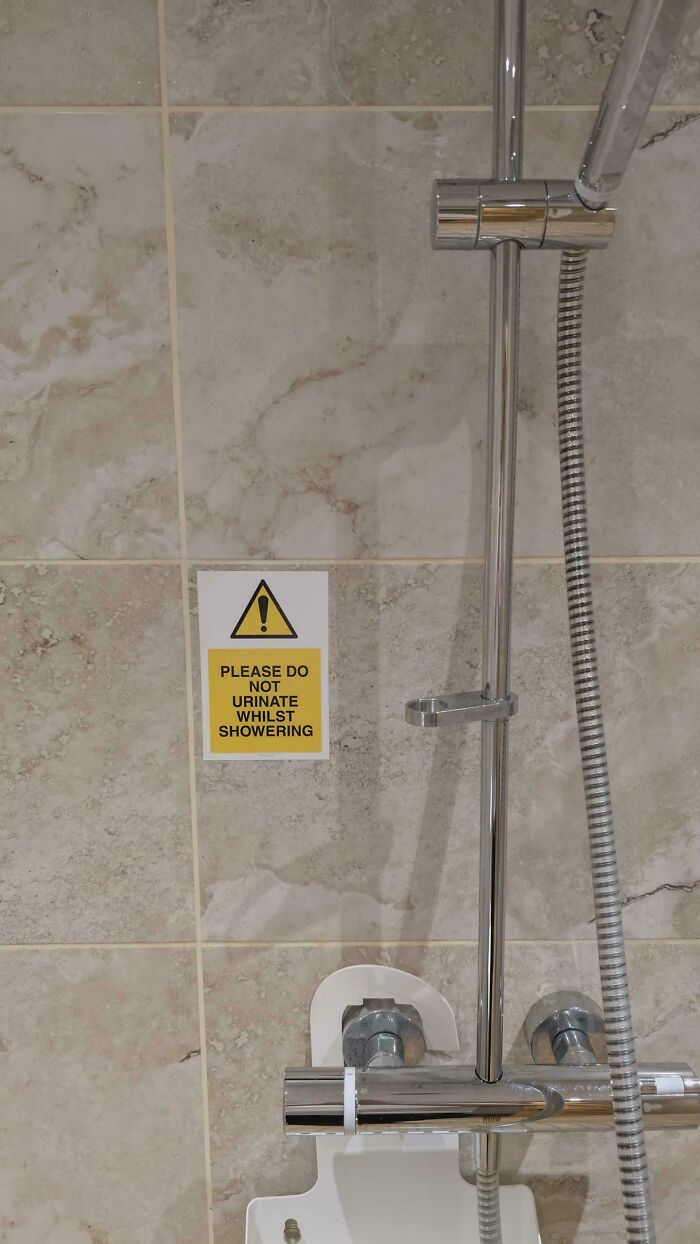 A passive-aggressive note in a shower warning not to urinate while showering.