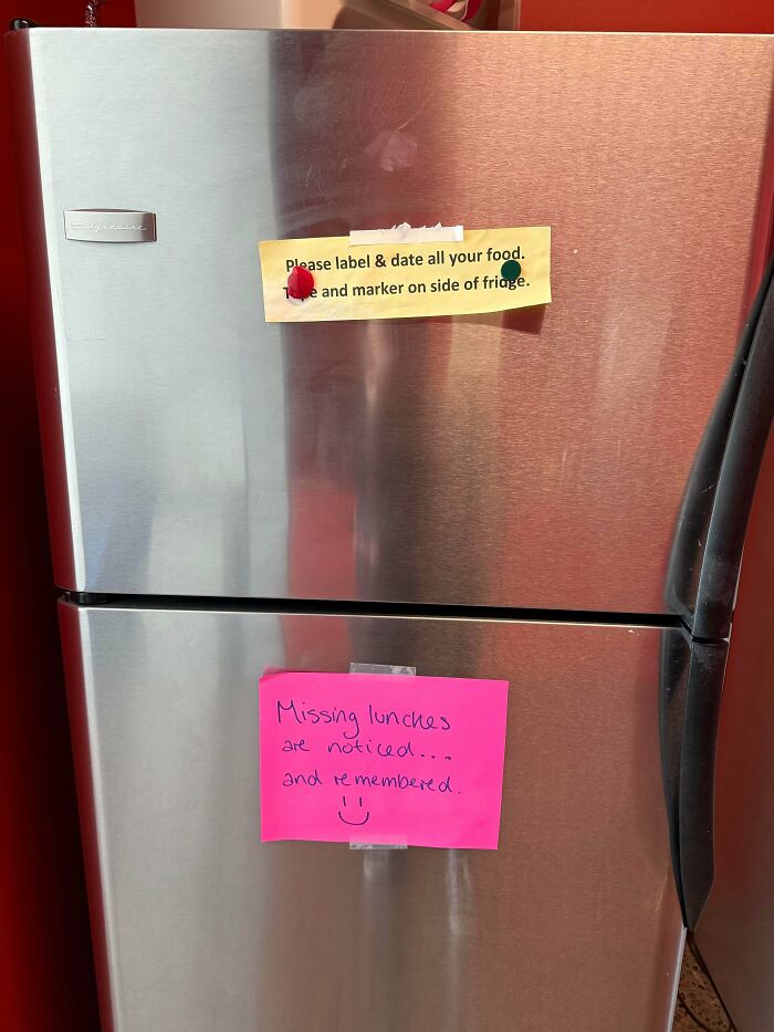 Passive-aggressive notes on a fridge about labeling food and missing lunches.