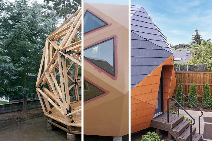 Wooden frame construction of a small modern home in wooded backyard