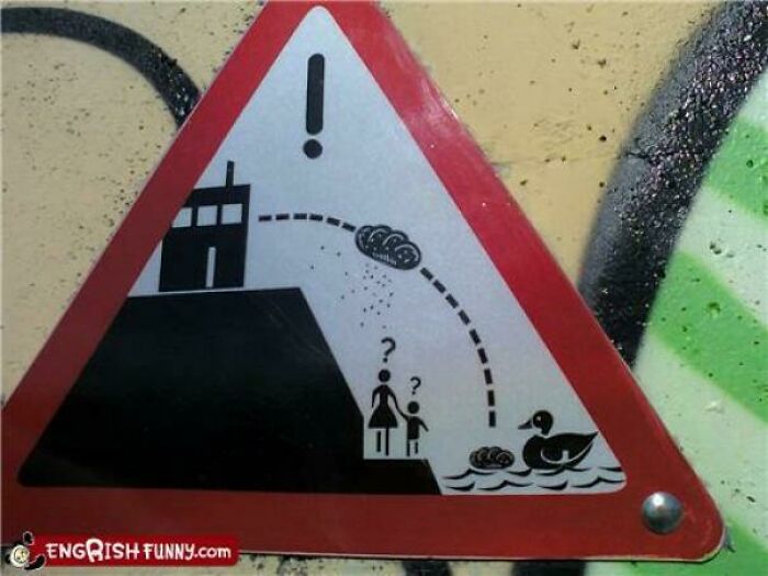 Warning sign showing a building, confused people, and a duck with bees flying between them in a humorous way