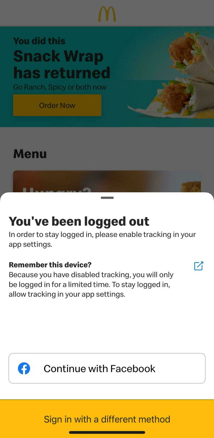 McDonald's app screen showing a logged out message urging users to enable tracking for advertisements on their car design.
