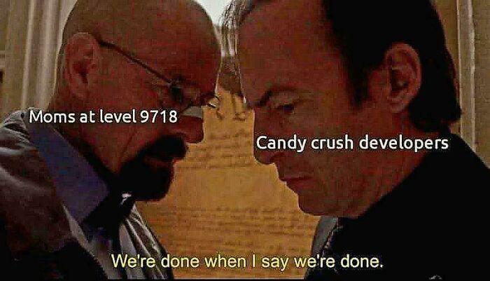 Two men face each other intensely in a meme about moms and Candy Crush developers, reflecting relatable posts and memes.