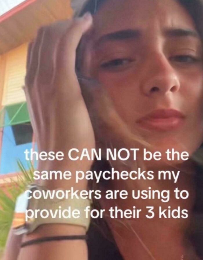 Young woman looking frustrated with text about paychecks and coworkers, capturing posts and memes about our lives feelings.