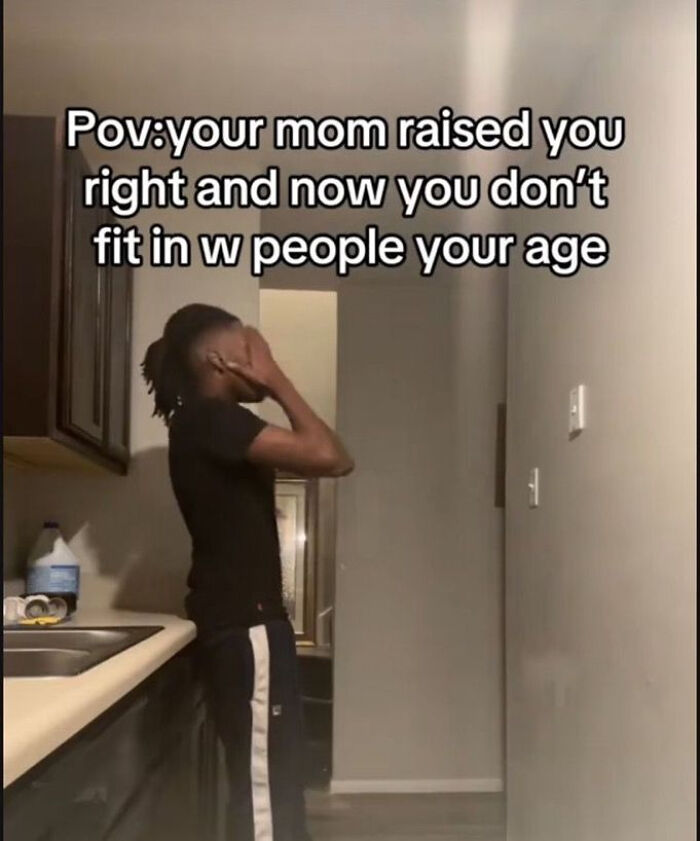 Young person in a kitchen with text about not fitting in with people their age, reflecting relatable posts and memes about life.