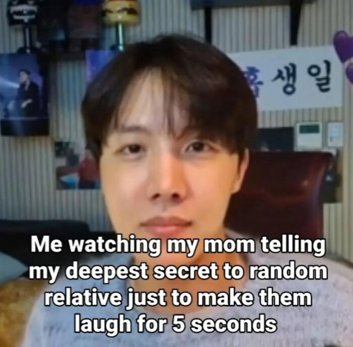 Young man watching his mom share a secret to a relative, capturing relatable posts and memes about life moments.