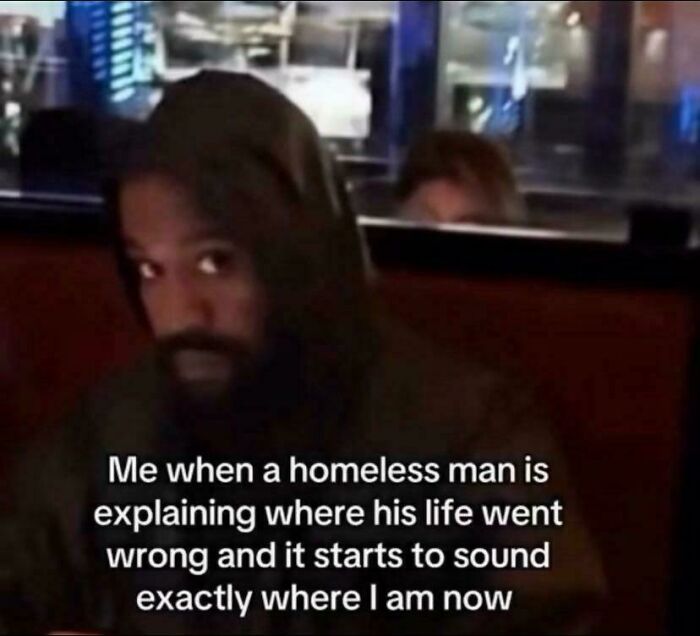 Man in a hoodie relating to a homeless man's story, reflecting lives in memes that hit a little too close to home.