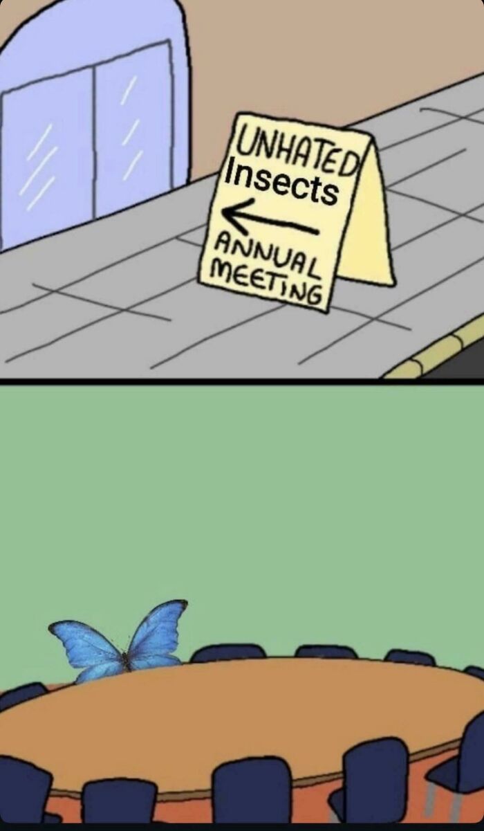 Sign on sidewalk pointing left to annual meeting of unhated insects, with a lone butterfly sitting at a large round table of chairs.
