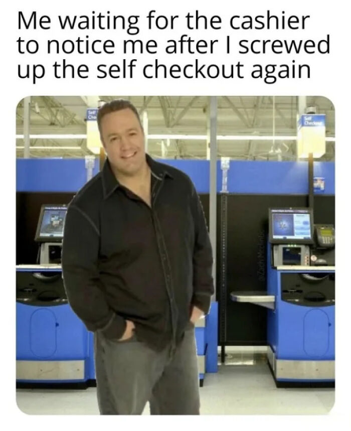 Man standing awkwardly by self checkout machines in a store, reflecting relatable moments about our lives and everyday struggles.