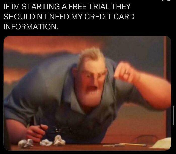 Angry animated character hitting table with fist, expressing frustration about free trial credit card requirements in relatable life meme.