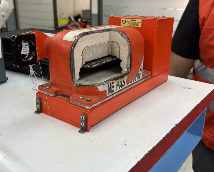 A cutaway view of a black box flight recorder, an interesting photo of aviation technology.