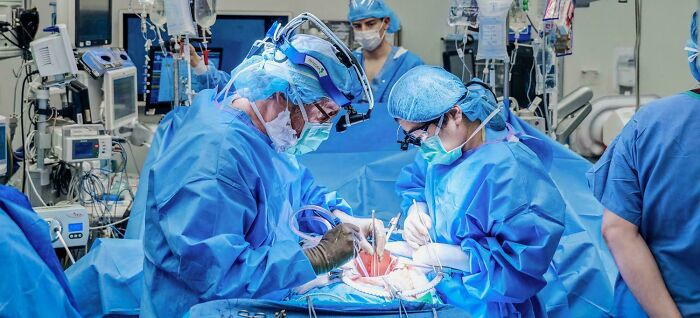 Surgeons performing a complex operation in a hospital, a fascinating and interesting photo.