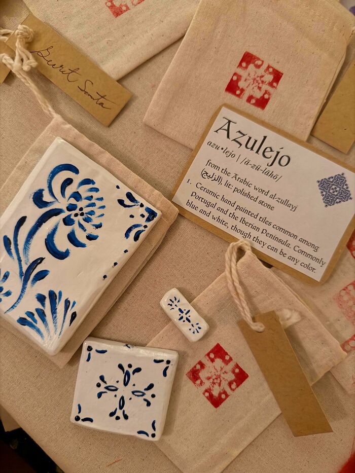 Azulejo tiles and fabric bags, one with a Secret Santa tag. Frugal tips for a whole new world.