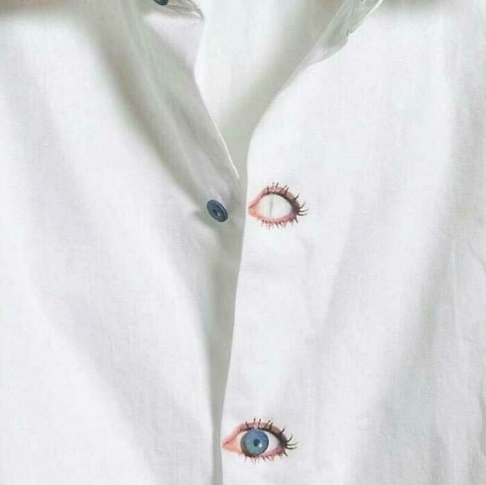 White shirt with buttons designed as realistic eyes