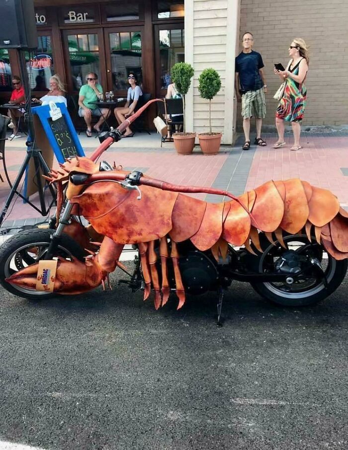 Motorcycle disguised as a lobster demonstrating unusual craftsmanship