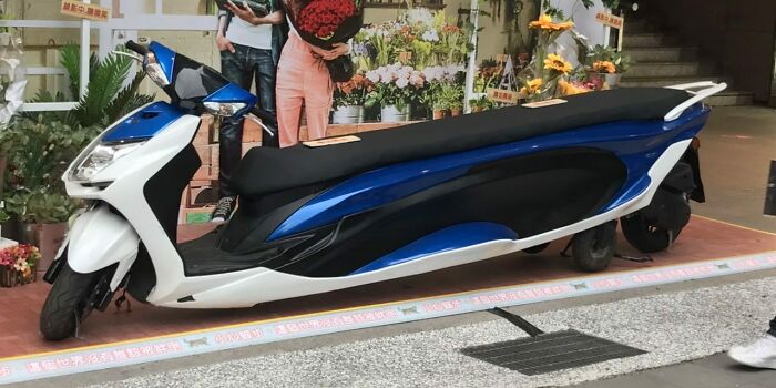 Extended blue and white scooter illustrating unique craftsmanship