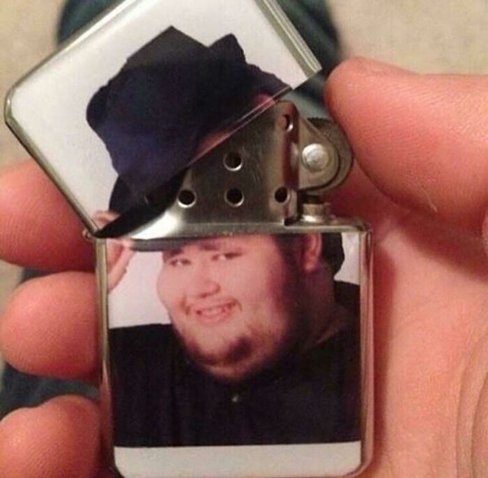 Lighter with photo of man whose hat aligns with lighter lid