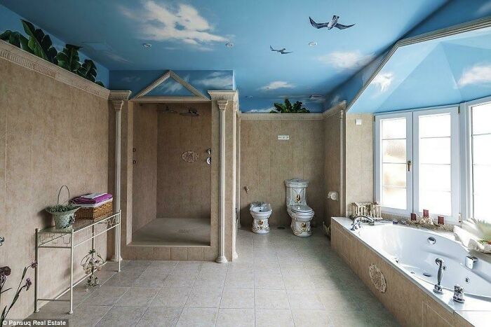 Luxury bathroom with sky ceiling featuring unique craftsmanship