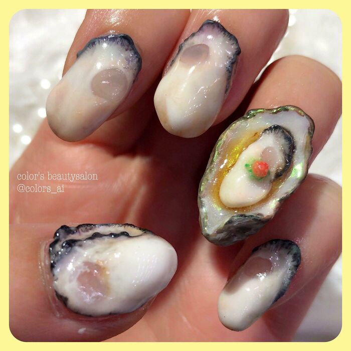 Flawless craftsmanship oyster shell 3D nail art design close-up