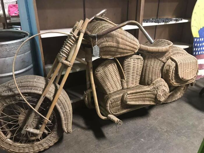 Intricately crafted wicker motorcycle sculpture showing craftsmanship