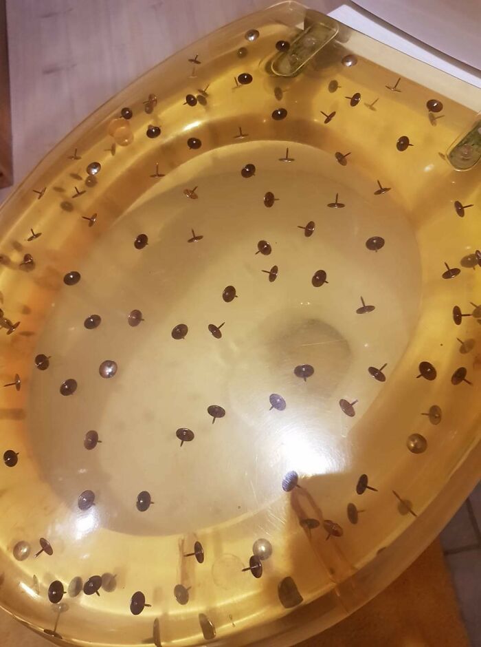 Bathtub filled with water and thumbtacks illustrating flawed craftsmanship