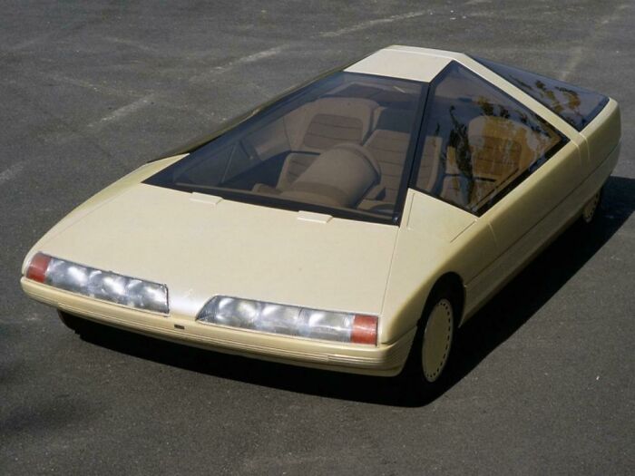 Retrofuturism futuristic car prototype with angular design and glass canopy