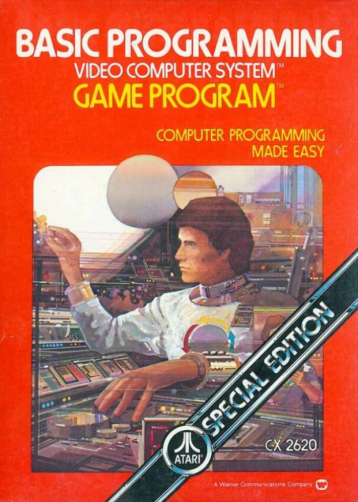 Vintage Atari BASIC programming video game cover art with retro computer design