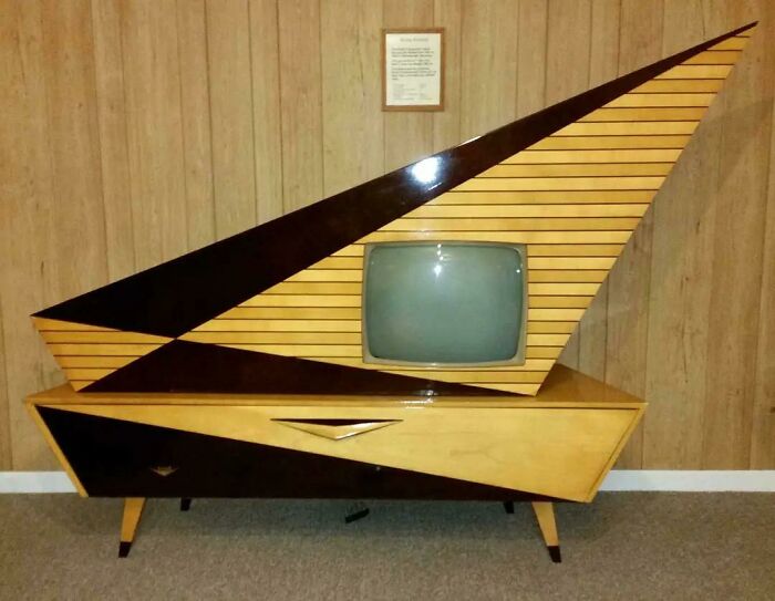 Retrofuturism vintage TV with sharp angular wood panel design