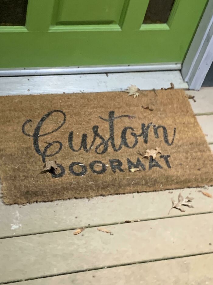 Doormat with misspelled word as a funny example of people failing to understand instructions causing hilarious misprints.