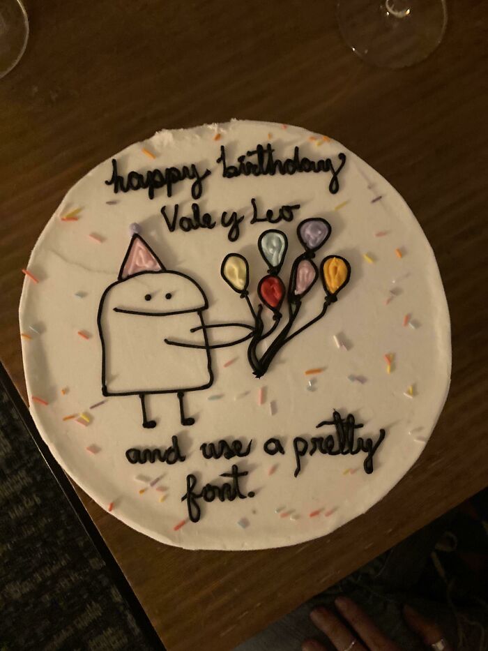Birthday cake with a humorous fail in writing and design, showcasing a hilarious misprint from misunderstood instructions.