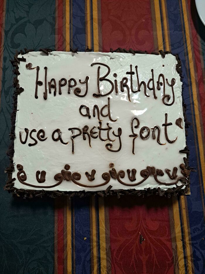 Birthday cake with a hilarious misprint in writing showing a literal interpretation of instructions and funny fonts.