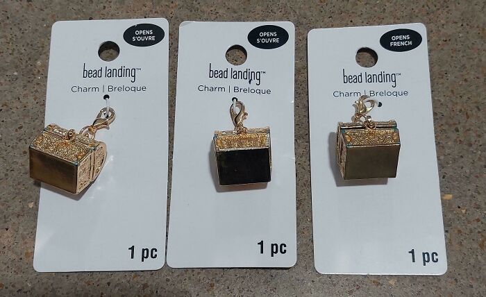 Three charm packages labeled with incorrect language instructions, showcasing funny instruction misunderstanding and misprints.