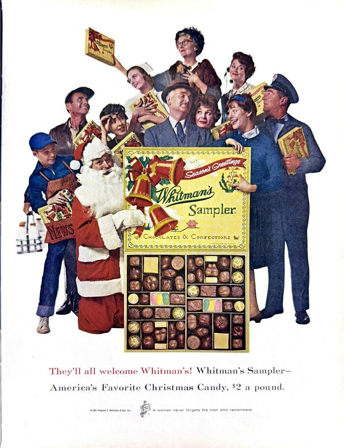 Vintage retro ad showing diverse group of people and Santa holding a large Whitman's chocolate sampler box at Christmas.