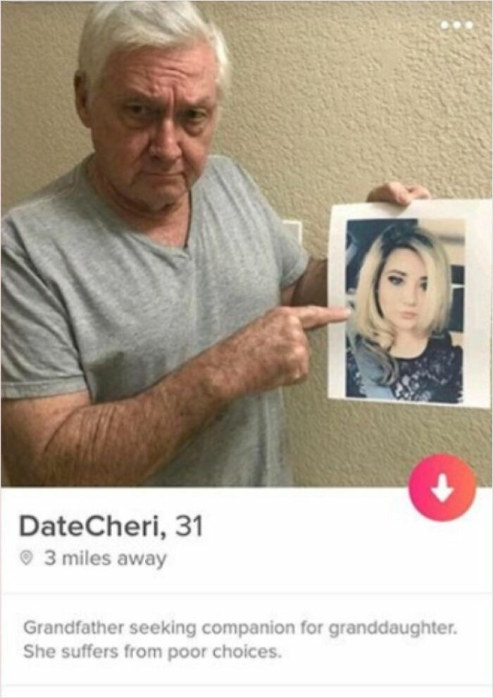 Older man in gray shirt holding photo of young woman in crazy Tinder profile from 54 Tinder profiles that went off the rails.