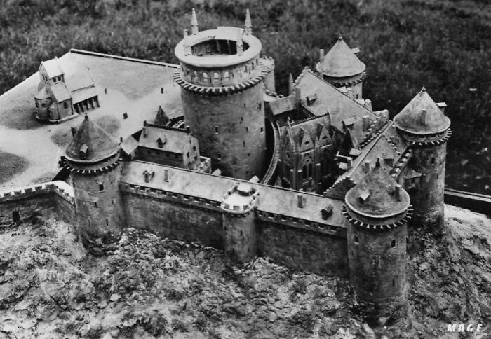 Black and white aerial view of an ancient castle model representing interesting buildings lost as the world changed.