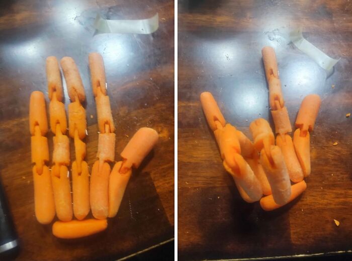 DIY project fail showing a hand model made of baby carrots on a wooden surface, demonstrating a deeply cursed creation.
