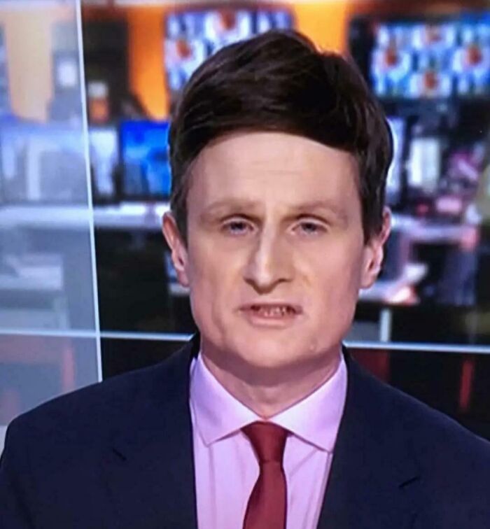 News presenter with an unusual hairstyle, illustrating one of the tragic hair accidents that might make you rethink trusting a hairstylist.