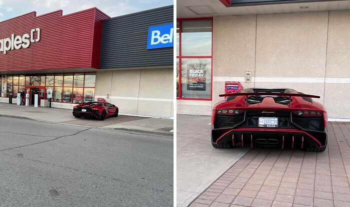 Luxury sports car parked lazily on a sidewalk near a store, showcasing an extreme example of laziness and lack of effort.