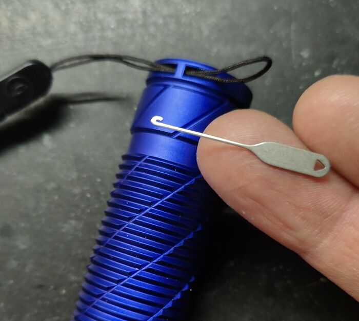 Small tool for threading string through tight spaces, showcasing a useful solution from interesting tools collection.