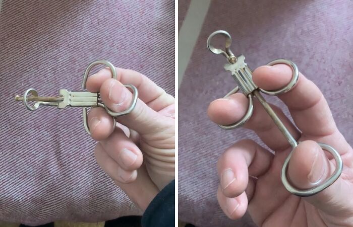 Hand holding a vintage metal tool, one of the interesting tools that might solve an annoying little problem.