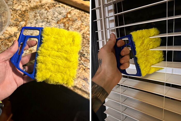 Hand holding a yellow fuzzy cleaning tool with a blue handle used for dusting window blinds, offering a handy solution tool.