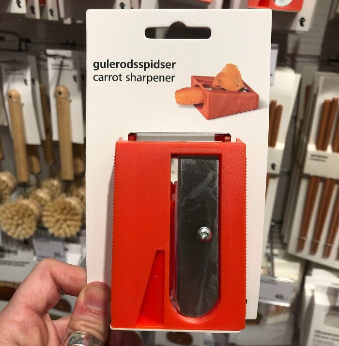 Carrot sharpener tool held in hand, designed to solve small kitchen problems with unique innovative tools.