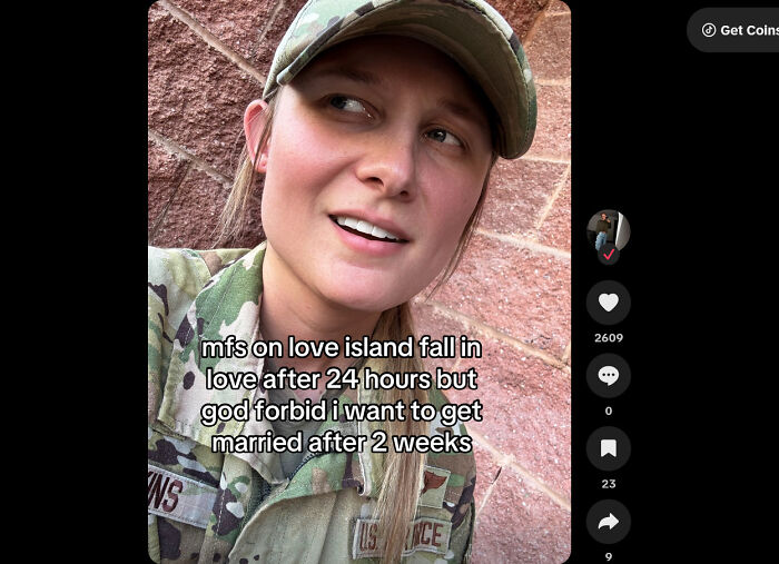 Person in military uniform with a hat, smiling and sharing a humorous cringe moment about quick love and marriage.